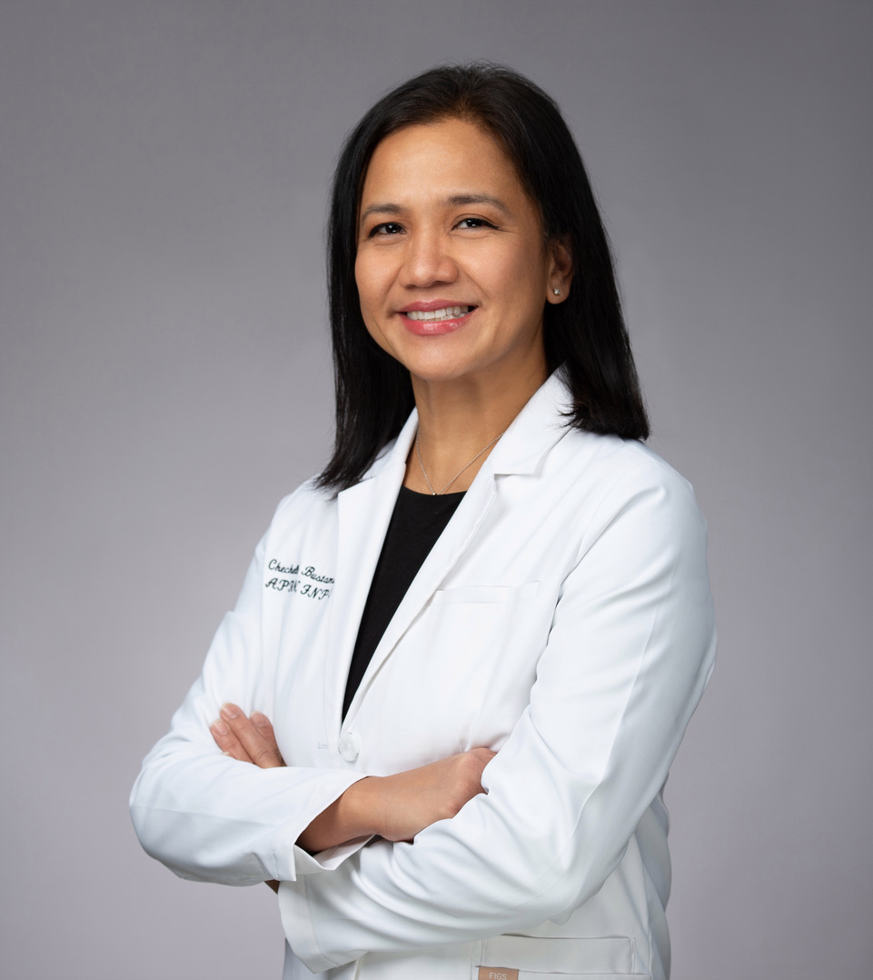 Smiling medical professional in white coat